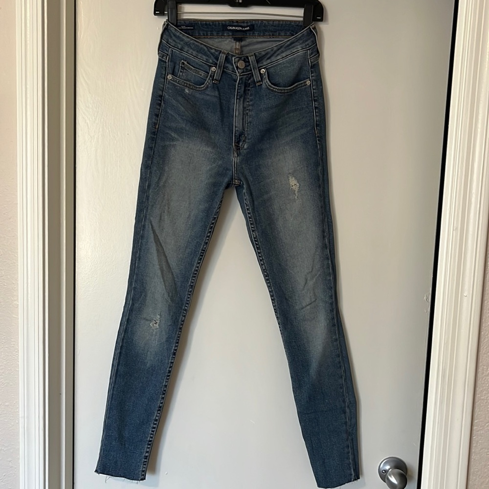 CKJ 010 High Rise Skinny Cut Bottom Denim